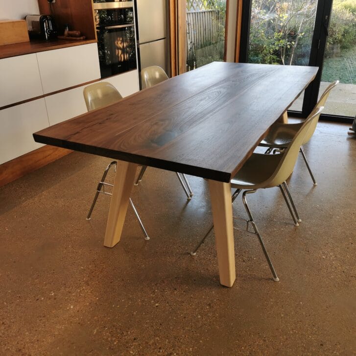 Bespoke solid walnut dining table handmade by cabinetmaker Oliver Legge Furniture