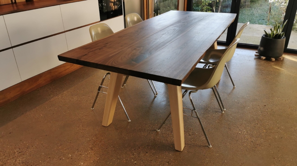 Bespoke solid walnut dining table handmade by cabinetmaker Oliver Legge Furniture